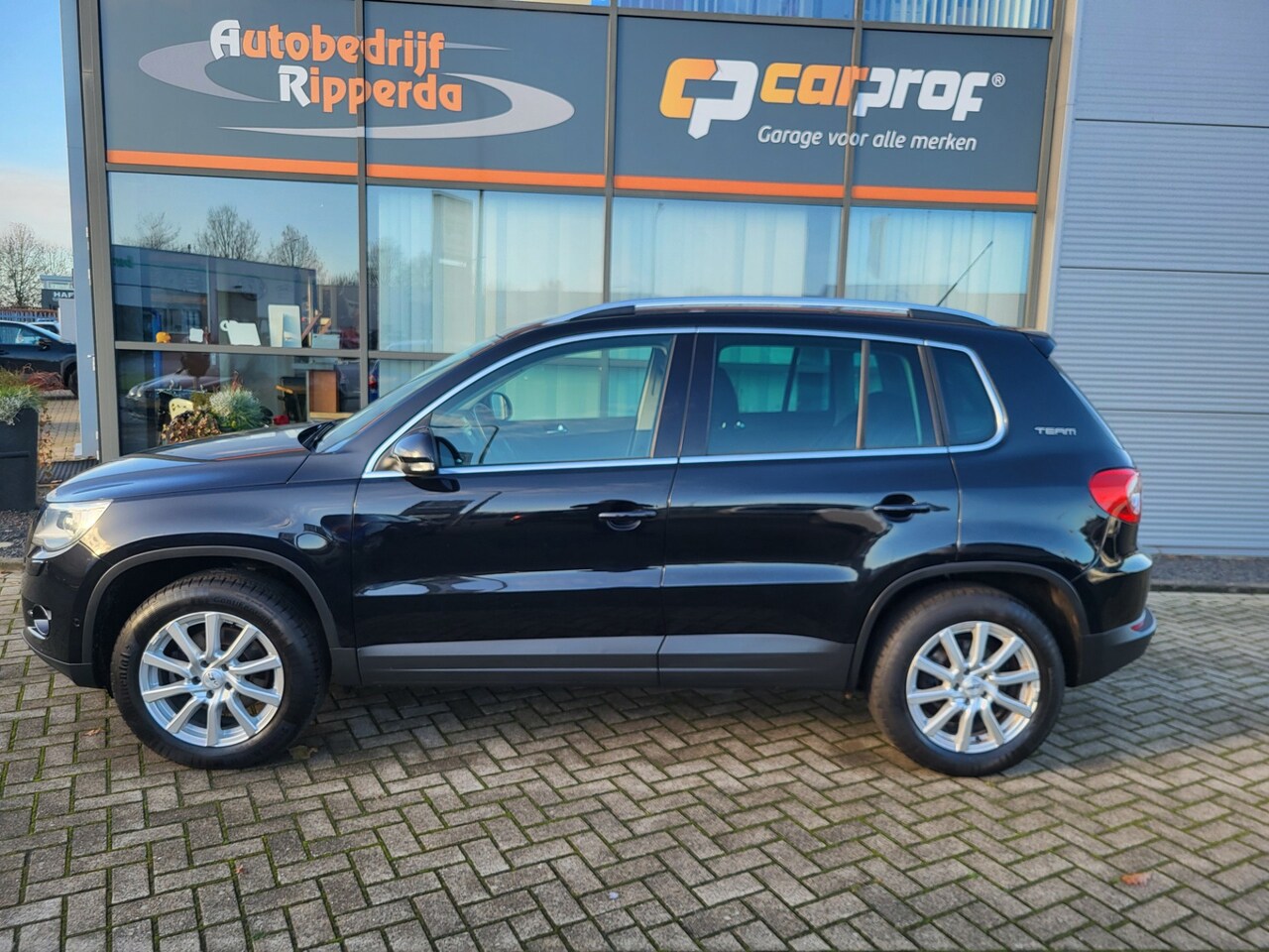 Volkswagen Tiguan - 2.0 TSI Sport&Style 4Motion - AutoWereld.nl