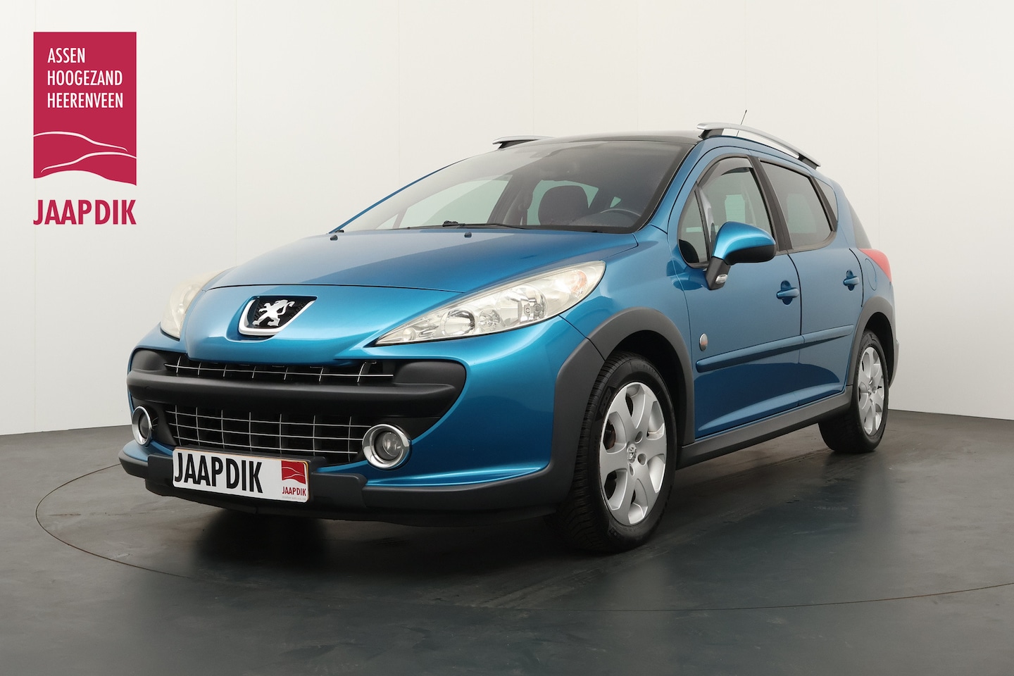 Peugeot 207 SW Outdoor - BWJ 2008 1.6 VTi 120 PK XS PANORAMA / CLIMA / CRUISE / TREKHAAK / HALF LEDER / PRIV. GLAS - AutoWereld.nl