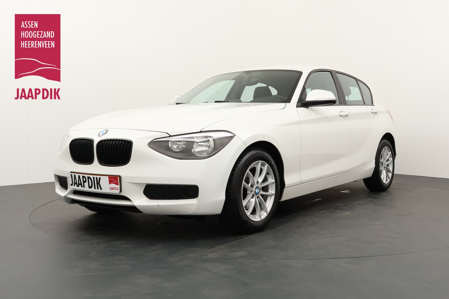 BMW 1-serie - BWJ 2014 102PK 114i EDE Corporate Lease Edition PARKEERSENOREN ACHTER / AIRCO / STOELVERWA - AutoWereld.nl