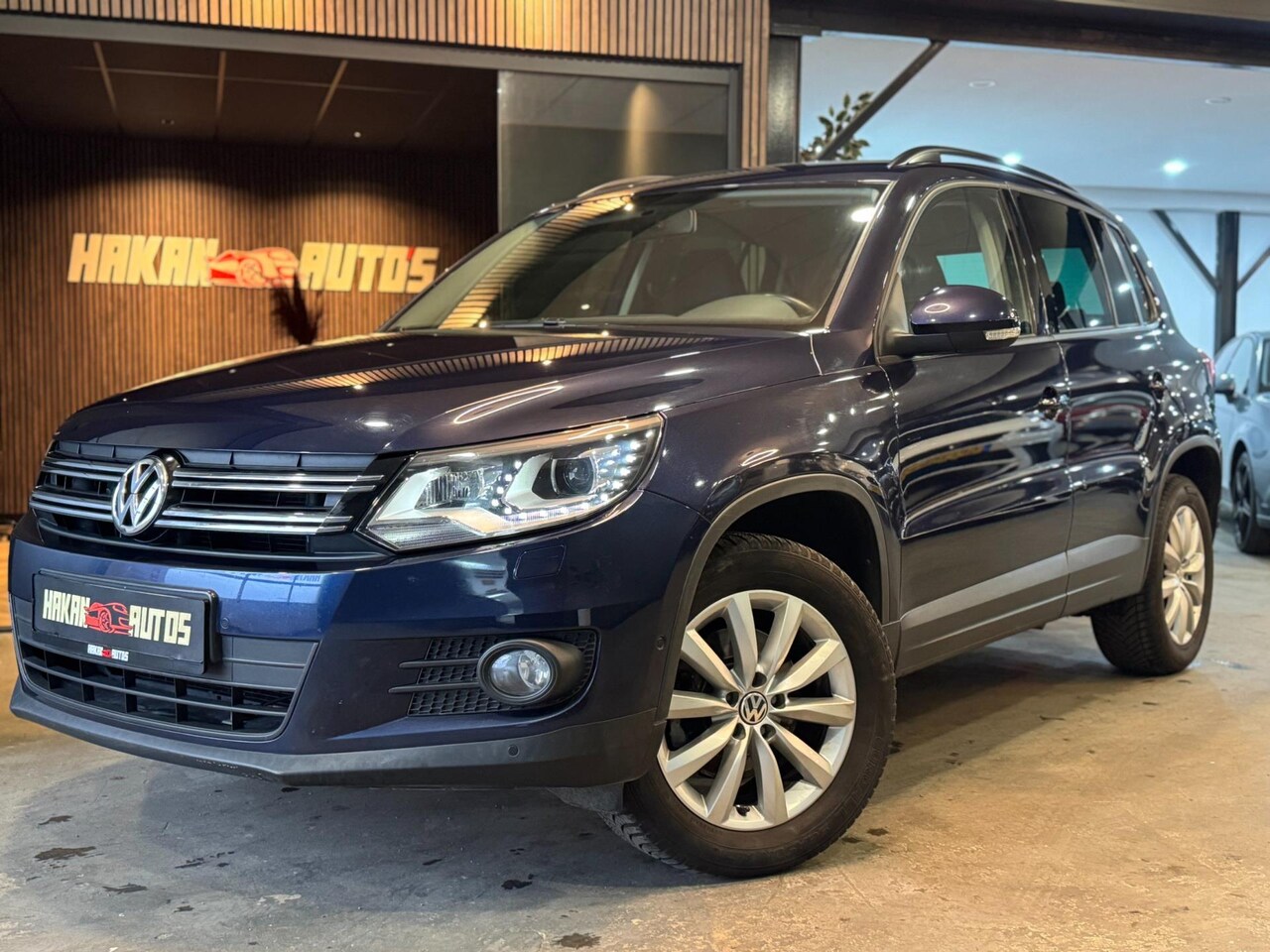 Volkswagen Tiguan - 1.4 TSI Sport&Style | Led | Xenon | Stoelverw. | Navigatie - AutoWereld.nl