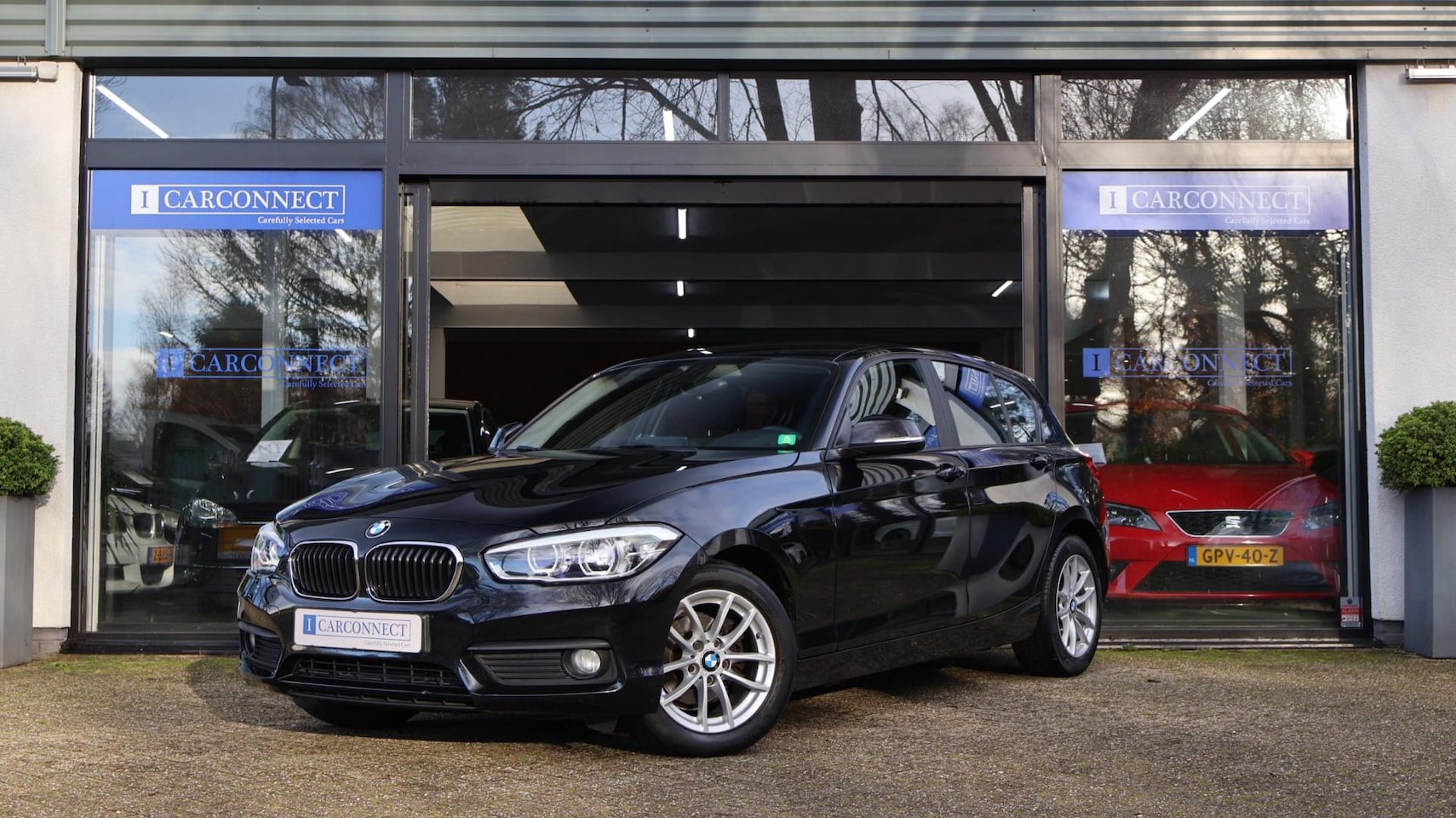 BMW 1-serie - 118i Centennial Exect.|Navi|PDC|Xenon|Clima|Cruise - AutoWereld.nl