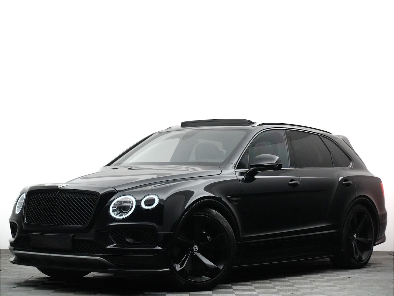 Bentley Bentayga - 4.0 V8 S Mulliner Blackline Design Pack (full carbon,dvd,tv,nightvision,head-up) - AutoWereld.nl