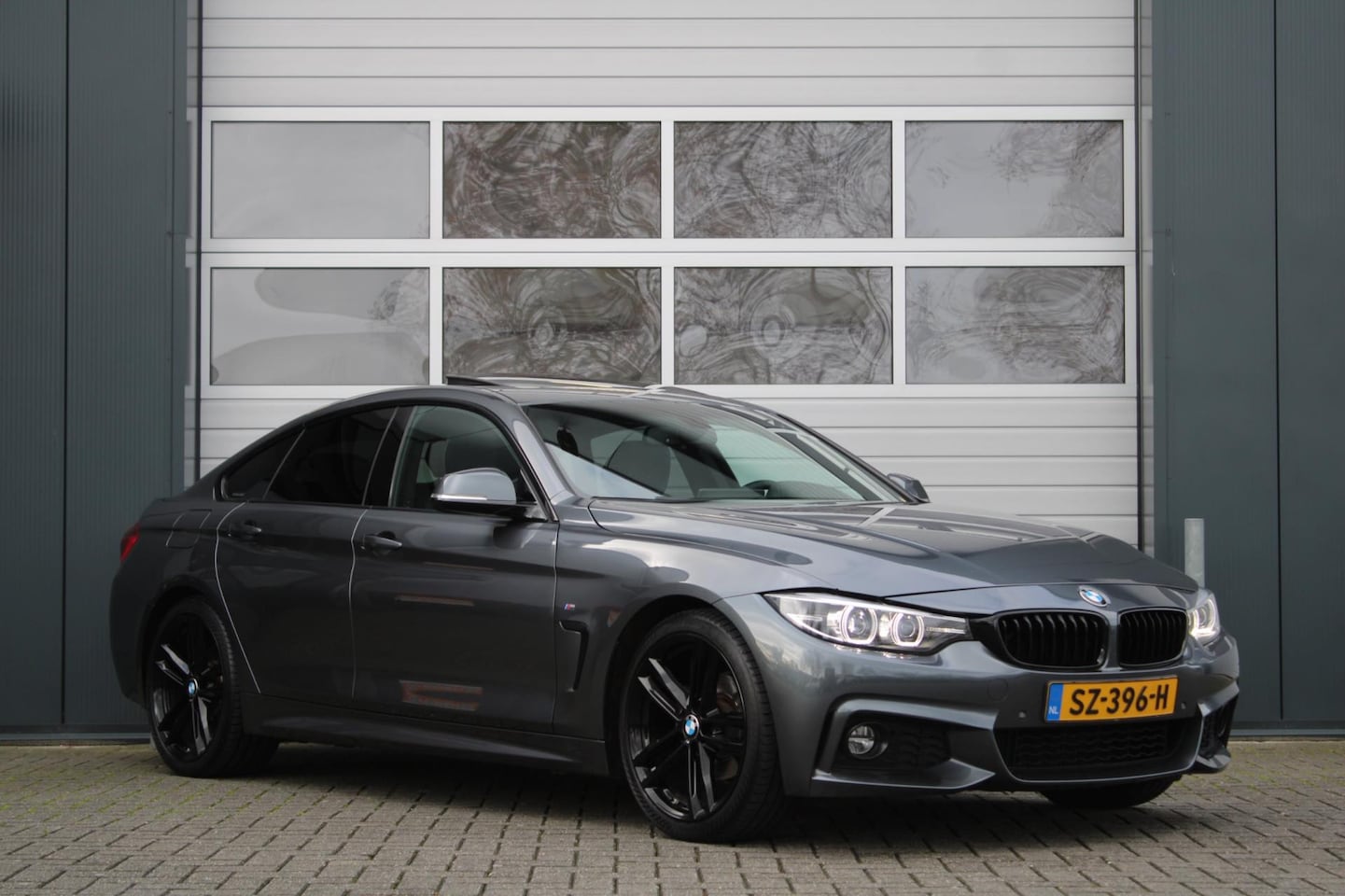 BMW 4-serie Gran Coupé - 420i High Executive M-Sport 184pk Navi/Schuifdak/Keyless/VirtualCockpit/Bluetooth/LED/DAB/ - AutoWereld.nl