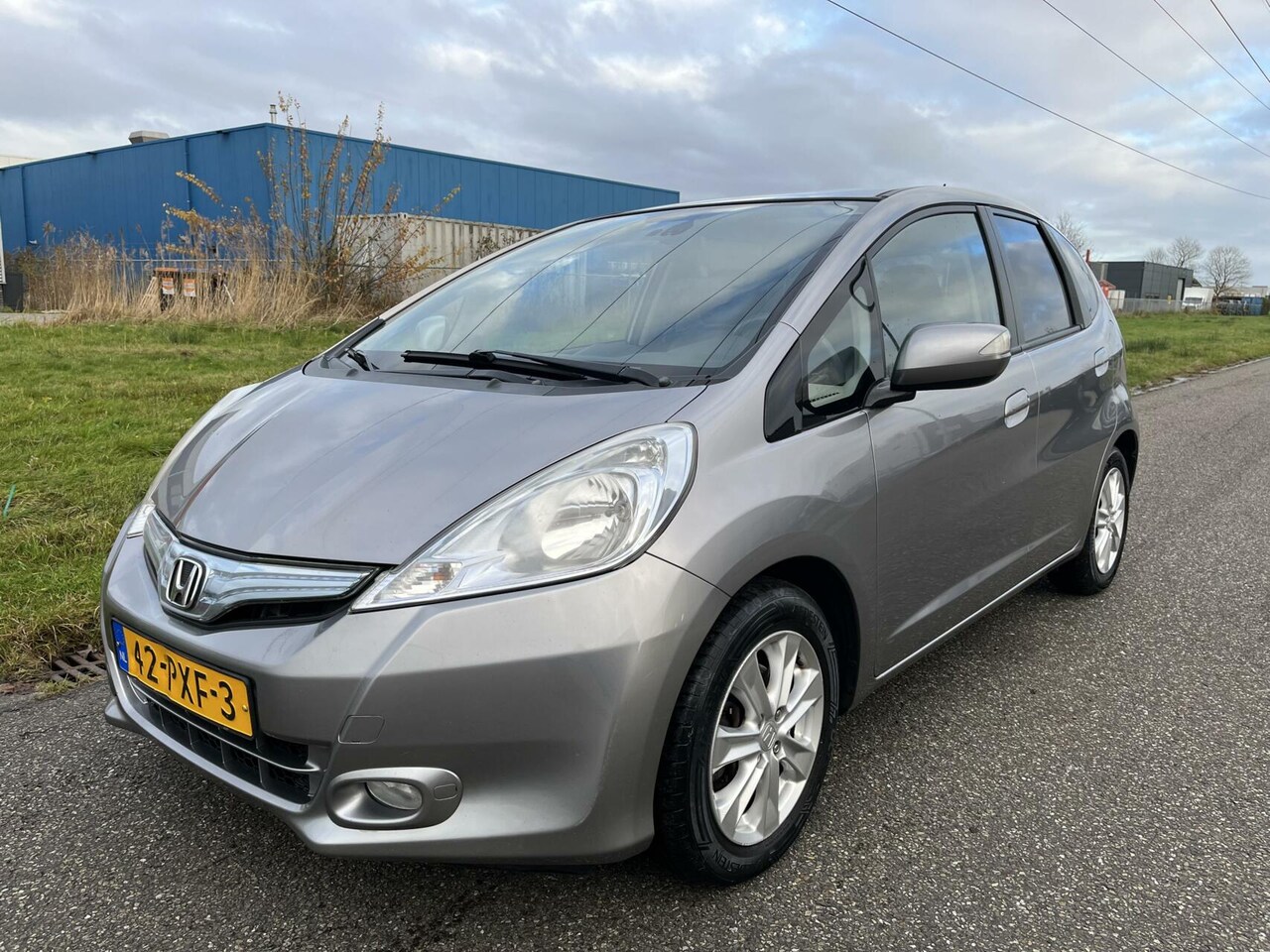 Honda Jazz - 1.4 Hybrid Elegance Automaat Leer Clima Cruise PDC - AutoWereld.nl