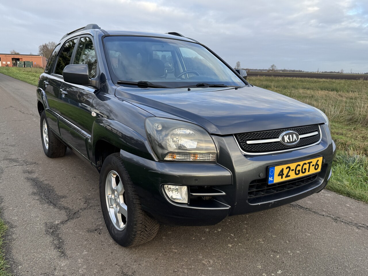 Kia Sportage - 2.0 CVVT All Stars AIRCO/CRUISE/TREKHAAK - AutoWereld.nl