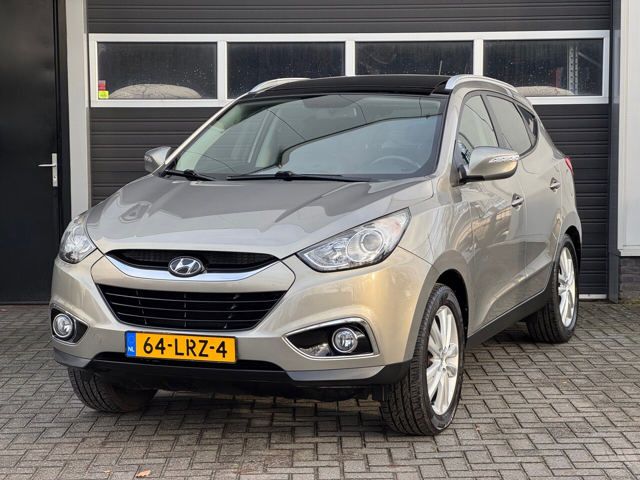 Hyundai ix35 - 2.0i i-Catcher Pano, Stoelverwarming, Keyless, Navi, NAP - AutoWereld.nl