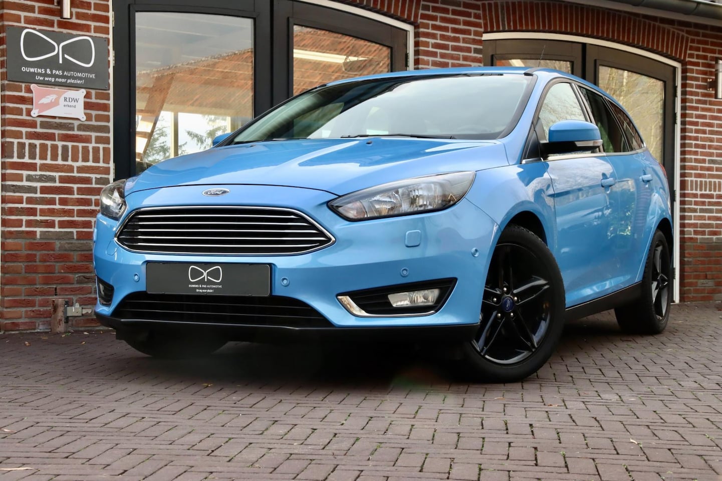 Ford Focus Wagon - 1.0 Titanium | NAVIGATIE | CRUISE | STOELVERWARMING - AutoWereld.nl