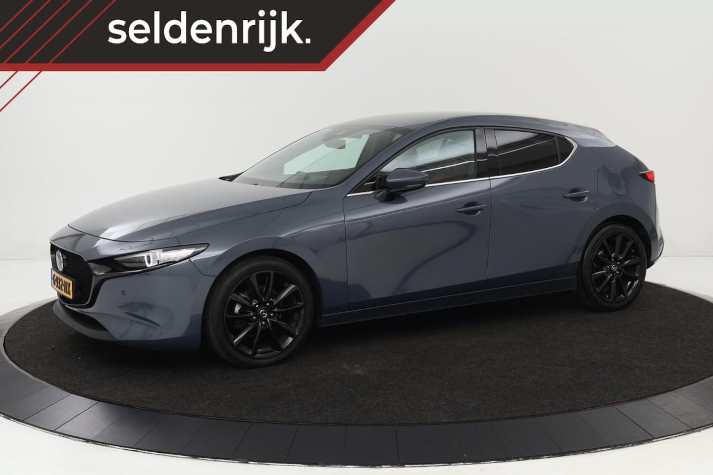 Mazda 3 - 2.0 SkyActive-X Luxury | Trekhaak | Leder | Stoel & stuurverwarming | Bose Sound | Head-Up - AutoWereld.nl