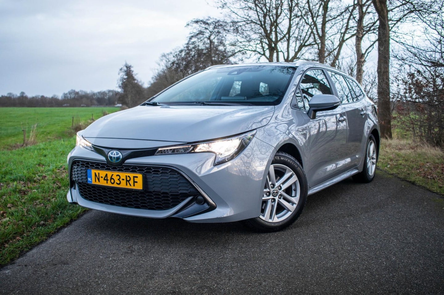 Toyota Corolla Touring Sports - 1.8 Hybrid Business | Navigatie | Trekhaak - AutoWereld.nl