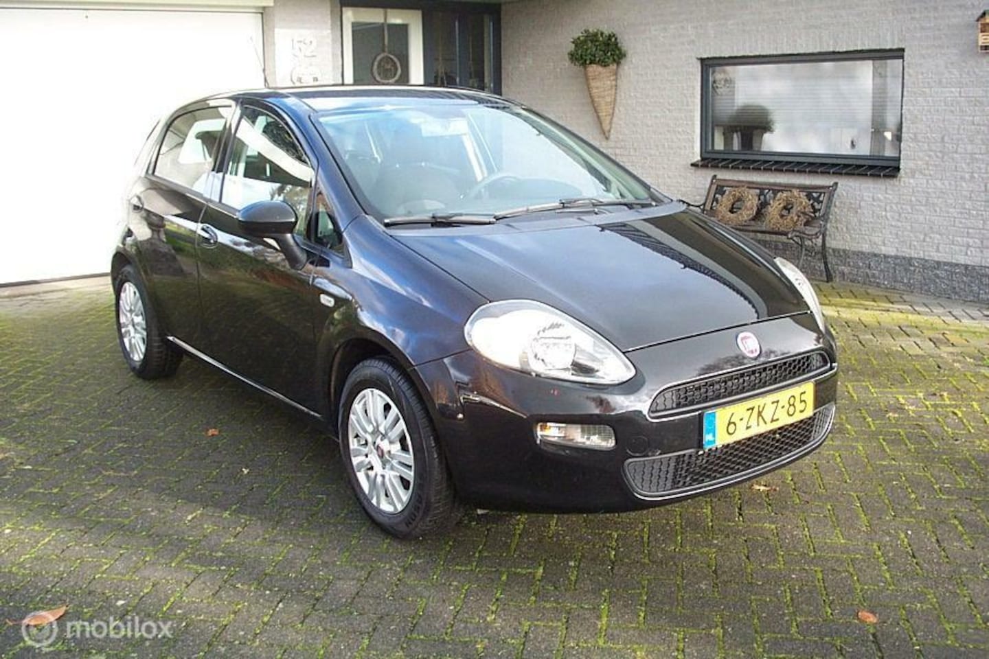 Fiat Punto Evo - 1.2 Pop Airco 88.065km Nap! - AutoWereld.nl