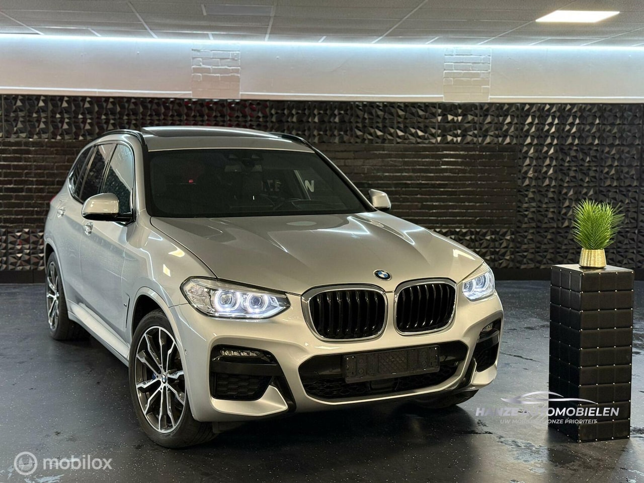 BMW X3 - xDrive30e High Executive M-sport HUD PANO - AutoWereld.nl