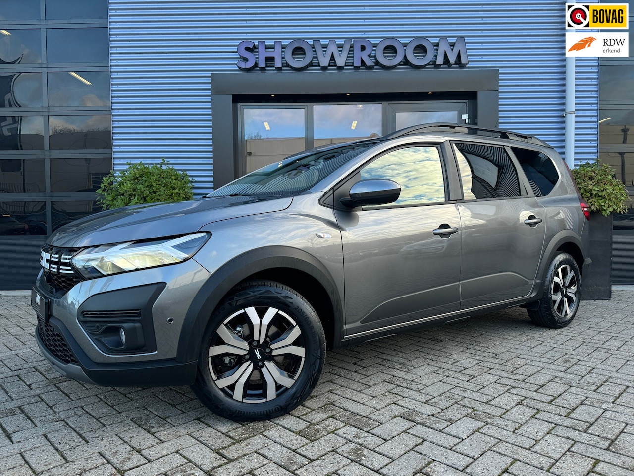 Dacia Jogger - 1.6 Hybrid 140 Automaat Expression Applecarplay|Stoelverwarming|Navi|Cruisecontrol|PDC|Cam - AutoWereld.nl