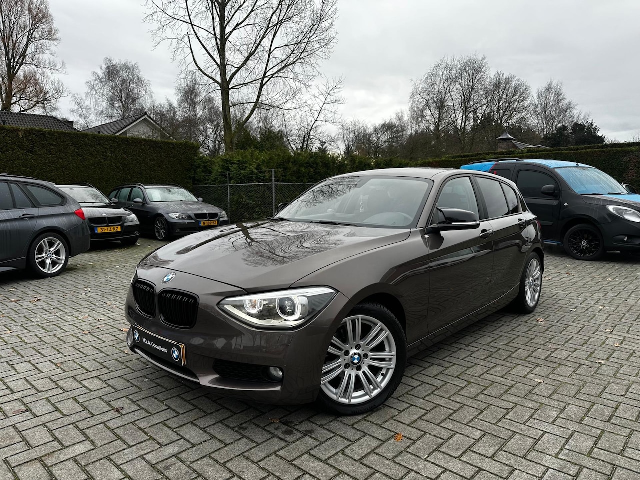 BMW 1-serie - 116i EDE Executive|Nwe Ketting + Klepseals|Groot Navi|Leder|Xenon|17 inch|Climate control| - AutoWereld.nl