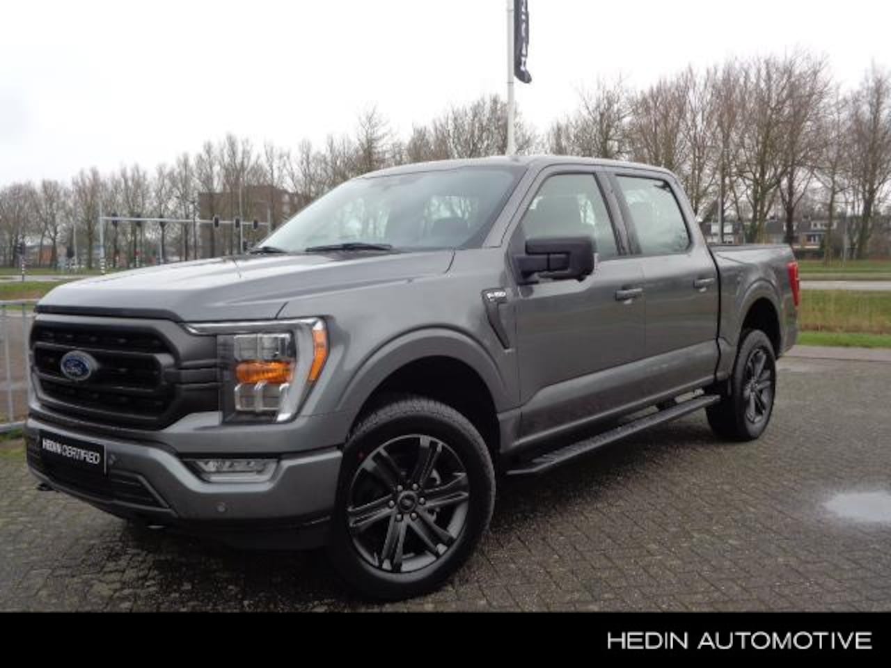 Ford F150 - F-150 XLT 5.0 V8 405PK SuperCrew 4x4 Sport - AutoWereld.nl