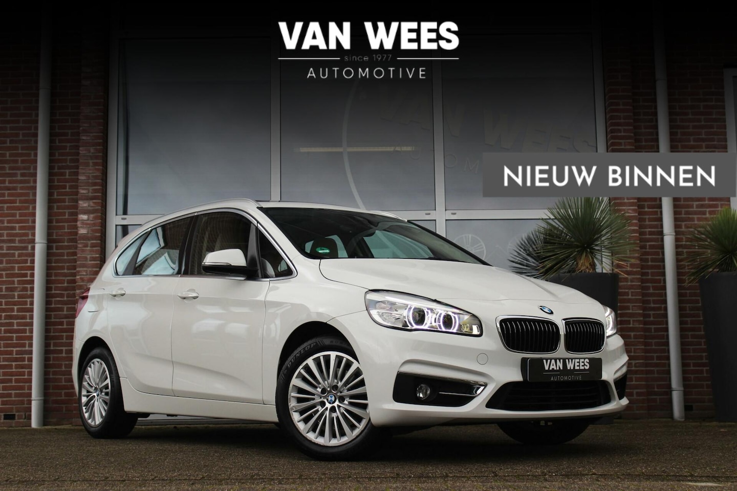 BMW 2-serie Active Tourer - 218i F45 High Executive Luxury-Line | Pano dak | LED | 17 inch | Leer | Navi | Stoelverwar - AutoWereld.nl