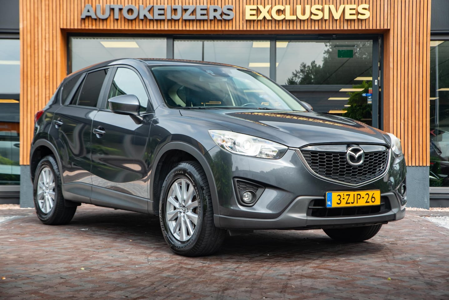 Mazda CX-5 - 2.0 Skylease 2WD Clima Cruise Navi Trekhaak 17''LM - AutoWereld.nl