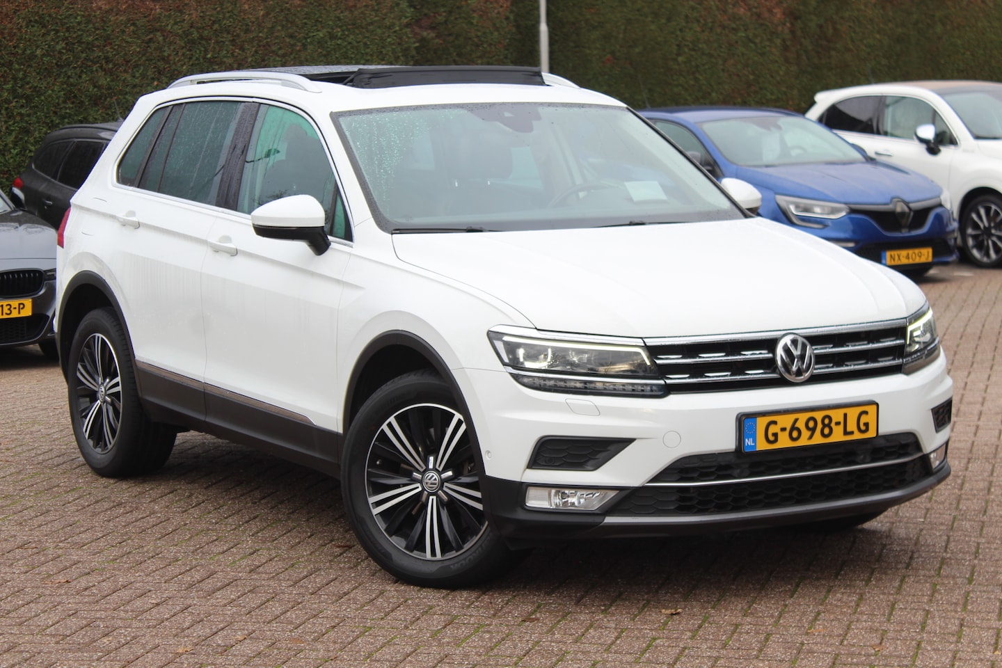 Volkswagen Tiguan - 2.0 TSI 4Motion Highline / Vol opties! / Panoramadak / Camera / Head-up / Leder / 18'' / K - AutoWereld.nl