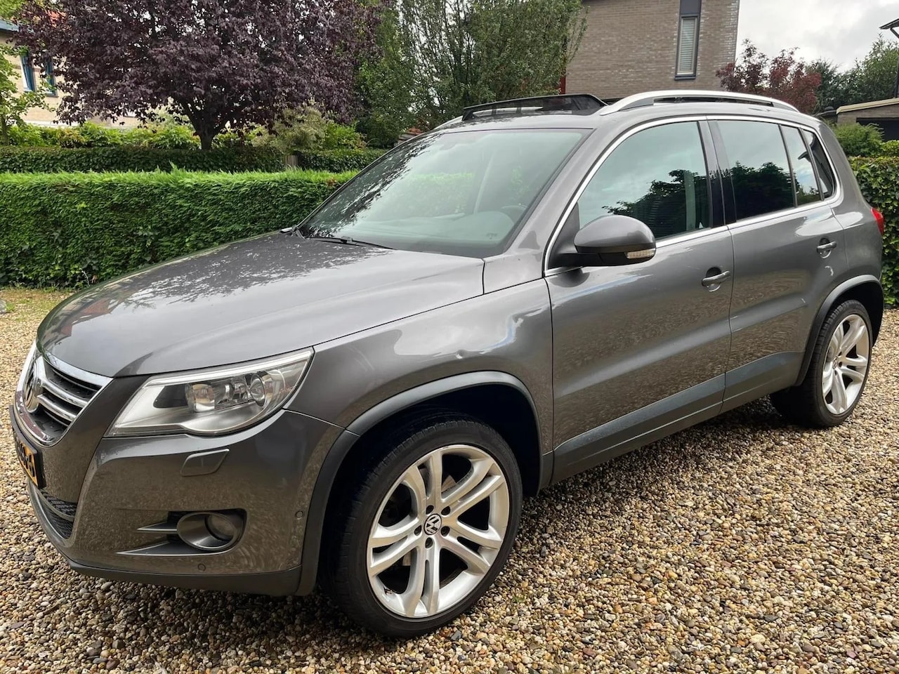 Volkswagen Tiguan - 2.0 TSI Sport&Style 4Motion - AutoWereld.nl