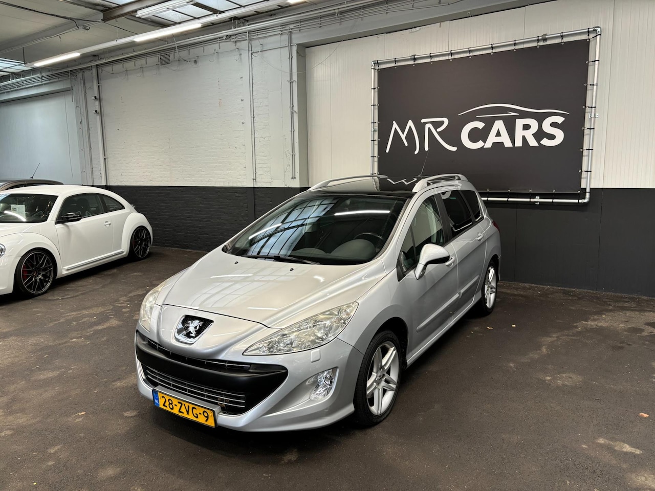 Peugeot 308 SW - 2.0 HDiF XT Airco/Cruise Control/Panodak - AutoWereld.nl