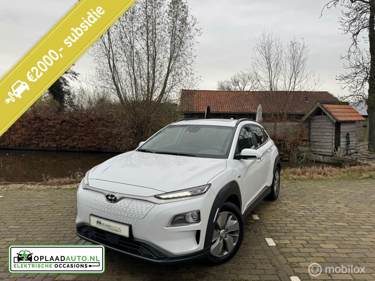 Hyundai Kona Electric - EV 64 Style | Schuifdak | 3 Fase | Trekhaak - AutoWereld.nl