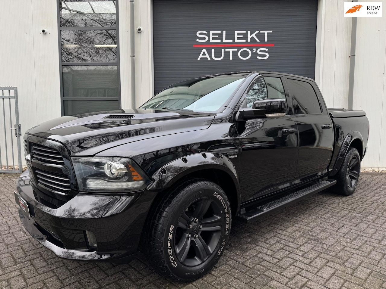 Dodge Ram 1500 - 5.7 Hemi V8 4x4 Quad Cab 6'4 MARGE LPG NAP Schuifdak/Leder/Trekhaak/Cruise/Bluetooth/Stoel - AutoWereld.nl