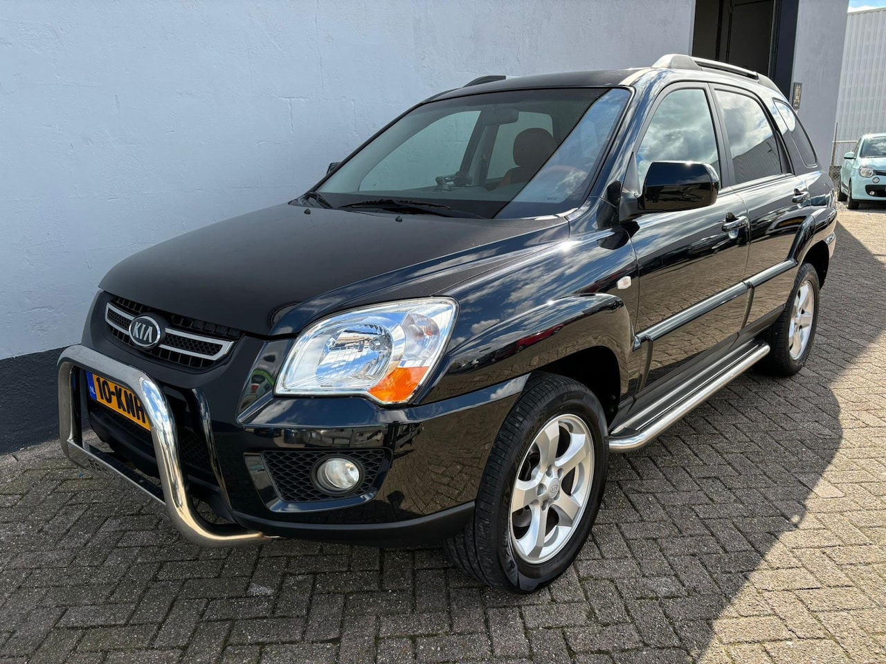 Kia Sportage - 2.0 CVVT Fifteen 2.0 CVVT Fifteen - AutoWereld.nl