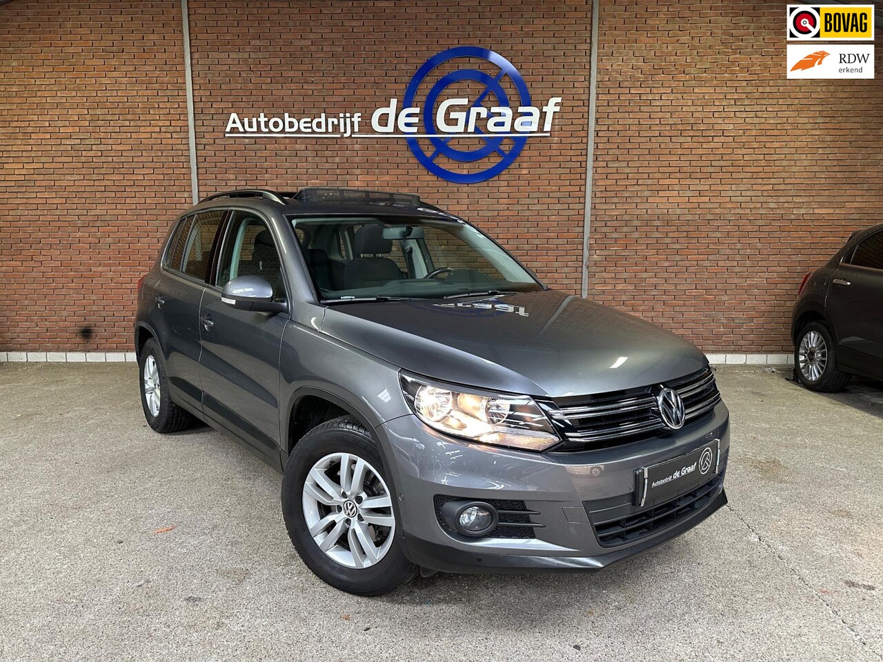 Volkswagen Tiguan - 1.4 TSI|PANO/TRHK/NAVI/PDC | KM 72500 - AutoWereld.nl