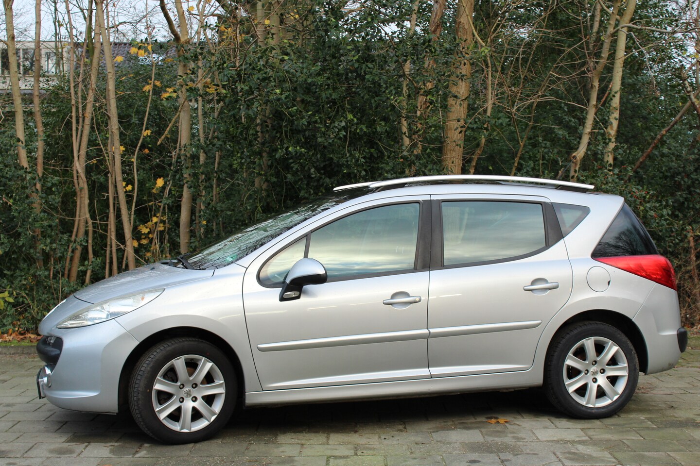 Peugeot 207 SW - cruise airco panorama dak 1.6 VTi Sublime - AutoWereld.nl