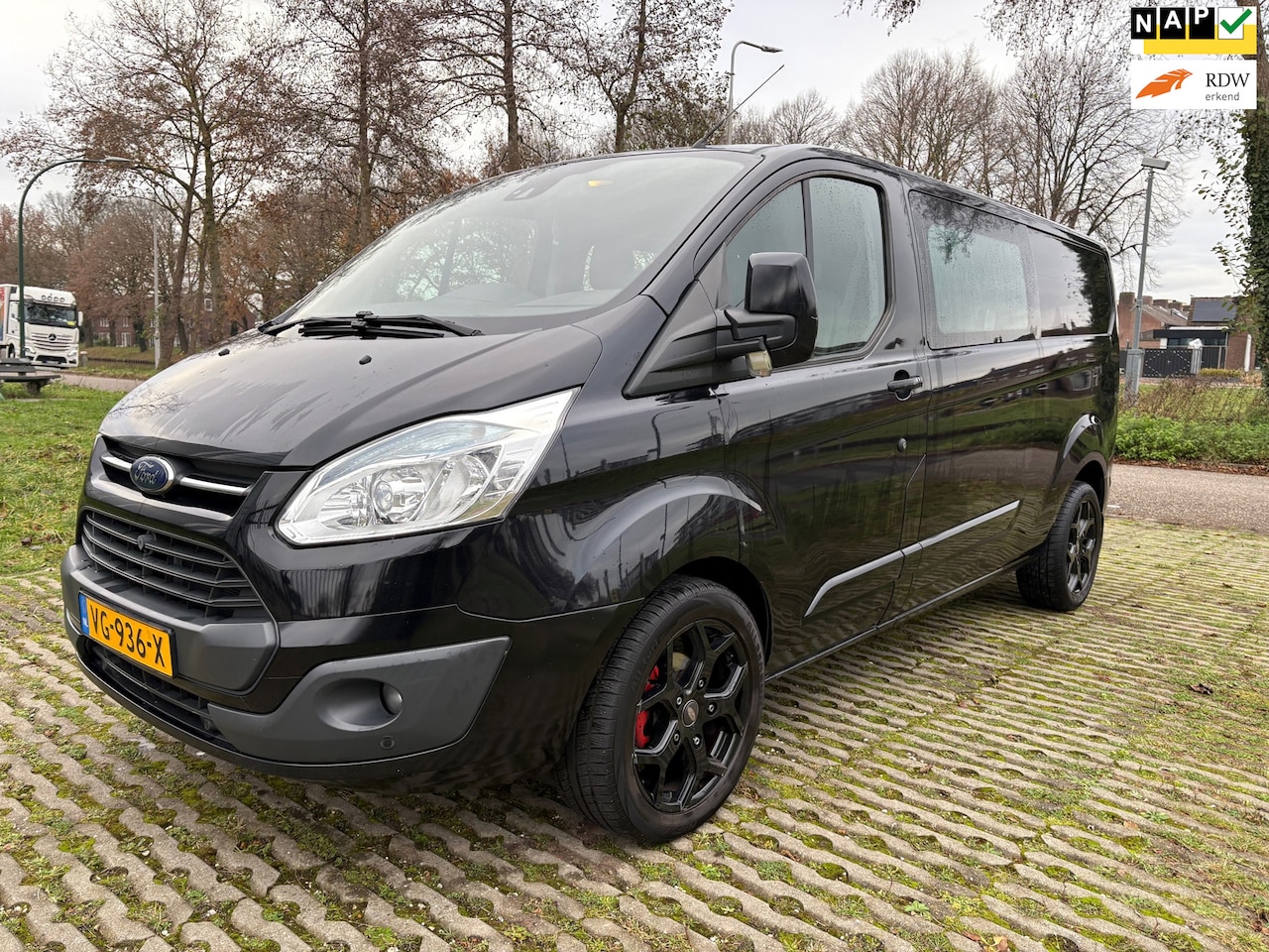 Ford Transit Custom - 290 2.2 TDCI L2H1 Limited / dubbel cabine / airco - AutoWereld.nl