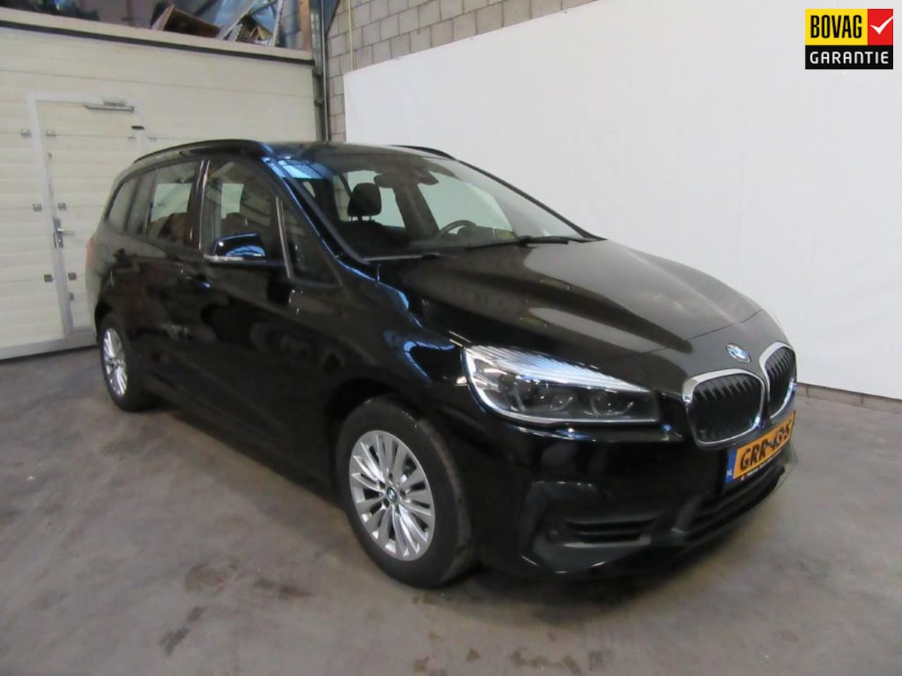 BMW 2-serie Gran Tourer - 218i 7pers. High Executive automaat trekhaak - AutoWereld.nl