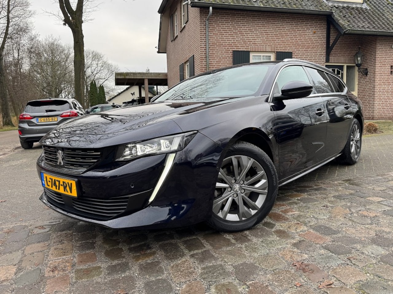 Peugeot 508 SW - 1.2 BL Allure autom ecc,1/2leer,lmv,led,navi,dglas,chroom - AutoWereld.nl