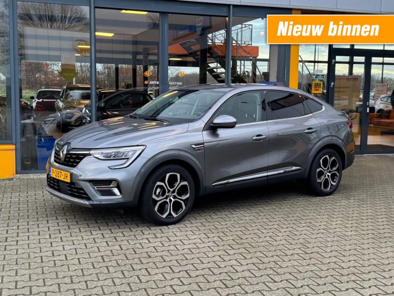 Renault Arkana - 1.6 E-Tech Hybride 145 Intens - camera - navi - adaptive cruise - AutoWereld.nl