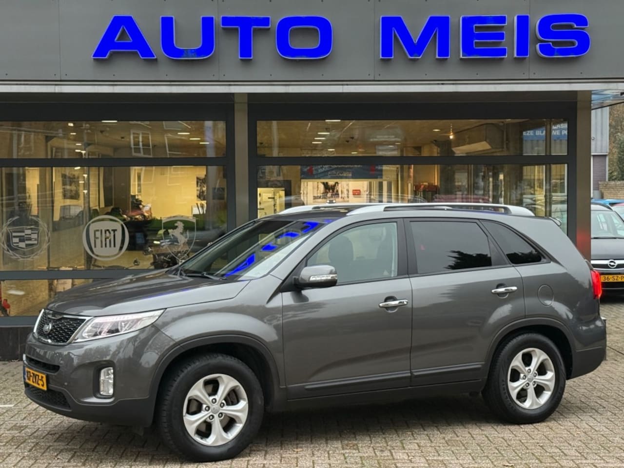 Kia Sorento - 2.4 GDI Plus Pack Automaat Navi Clima Cruise Camera PDC - AutoWereld.nl