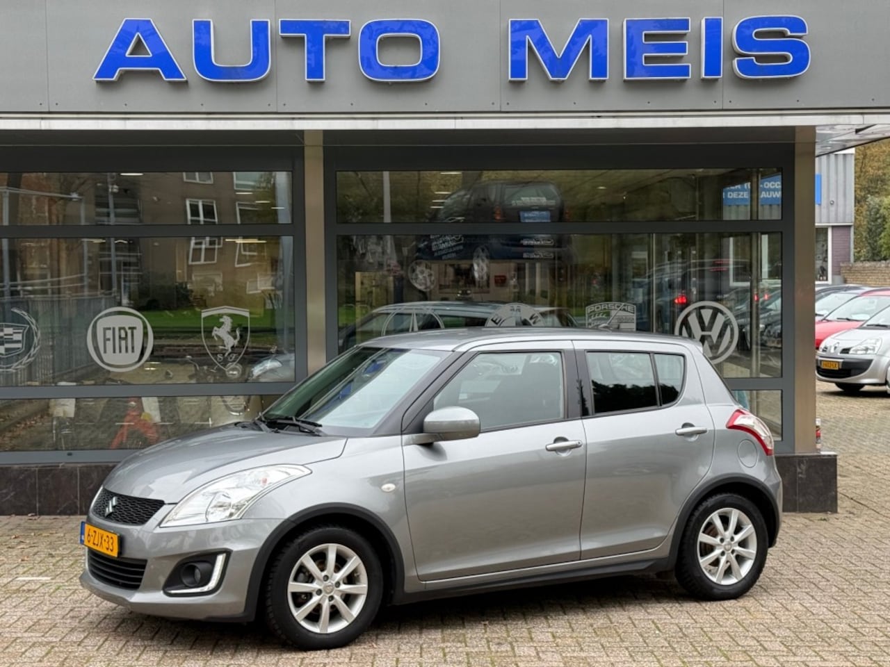 Suzuki Swift - 1.2 Dynamic EASSS Airco Cruise Control LM-Velgen LED - AutoWereld.nl