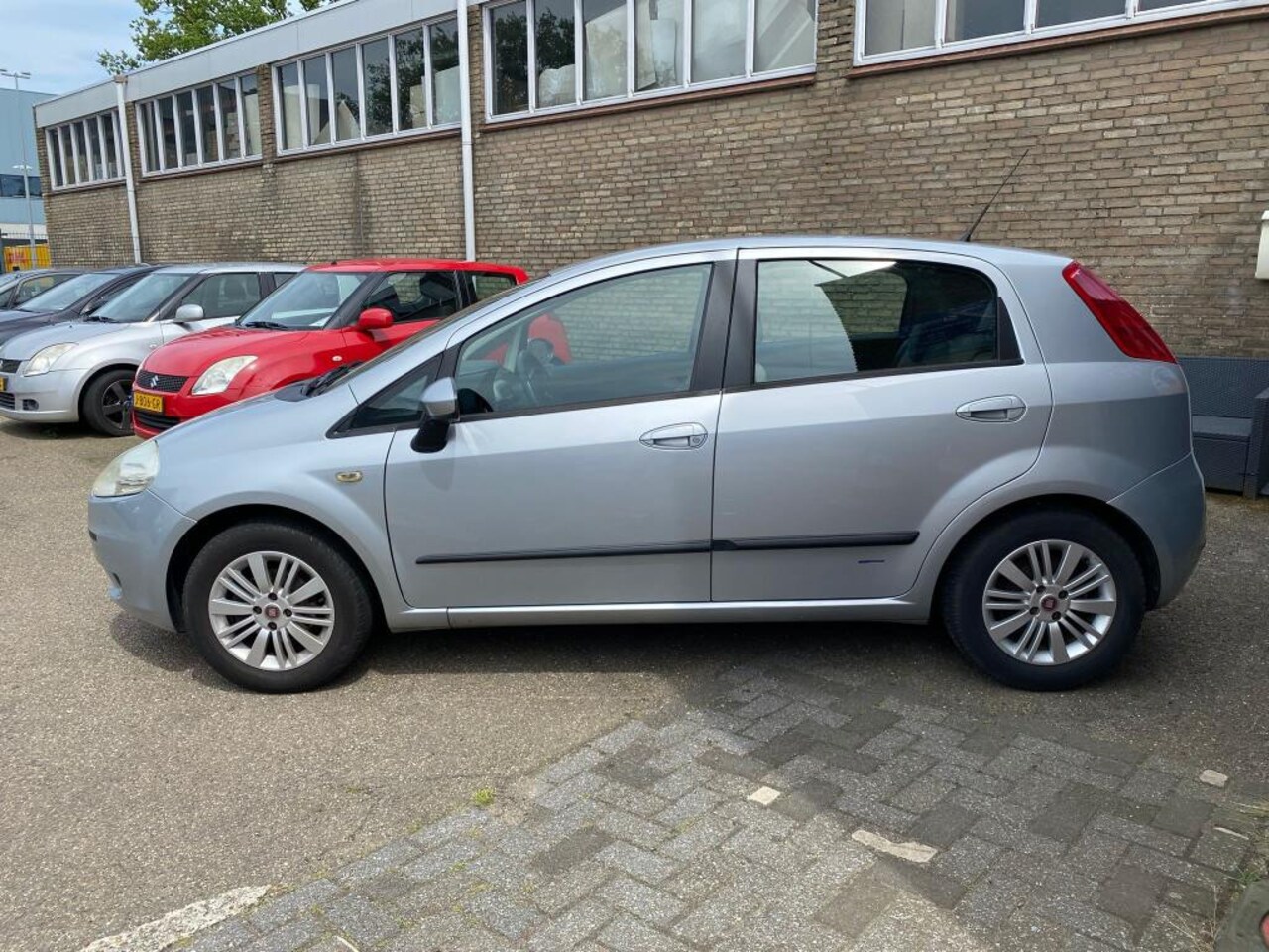 Fiat Grande Punto - 1.4 Edizione Cool Automaat - AutoWereld.nl