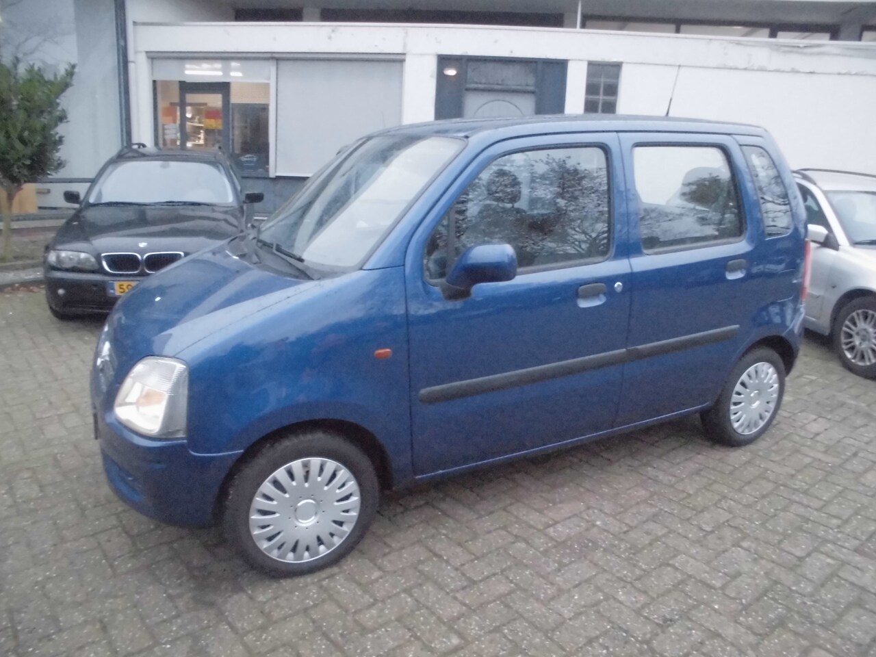 Opel Agila - 1.0-12V Comfort 1.0-12V Comfort - AutoWereld.nl