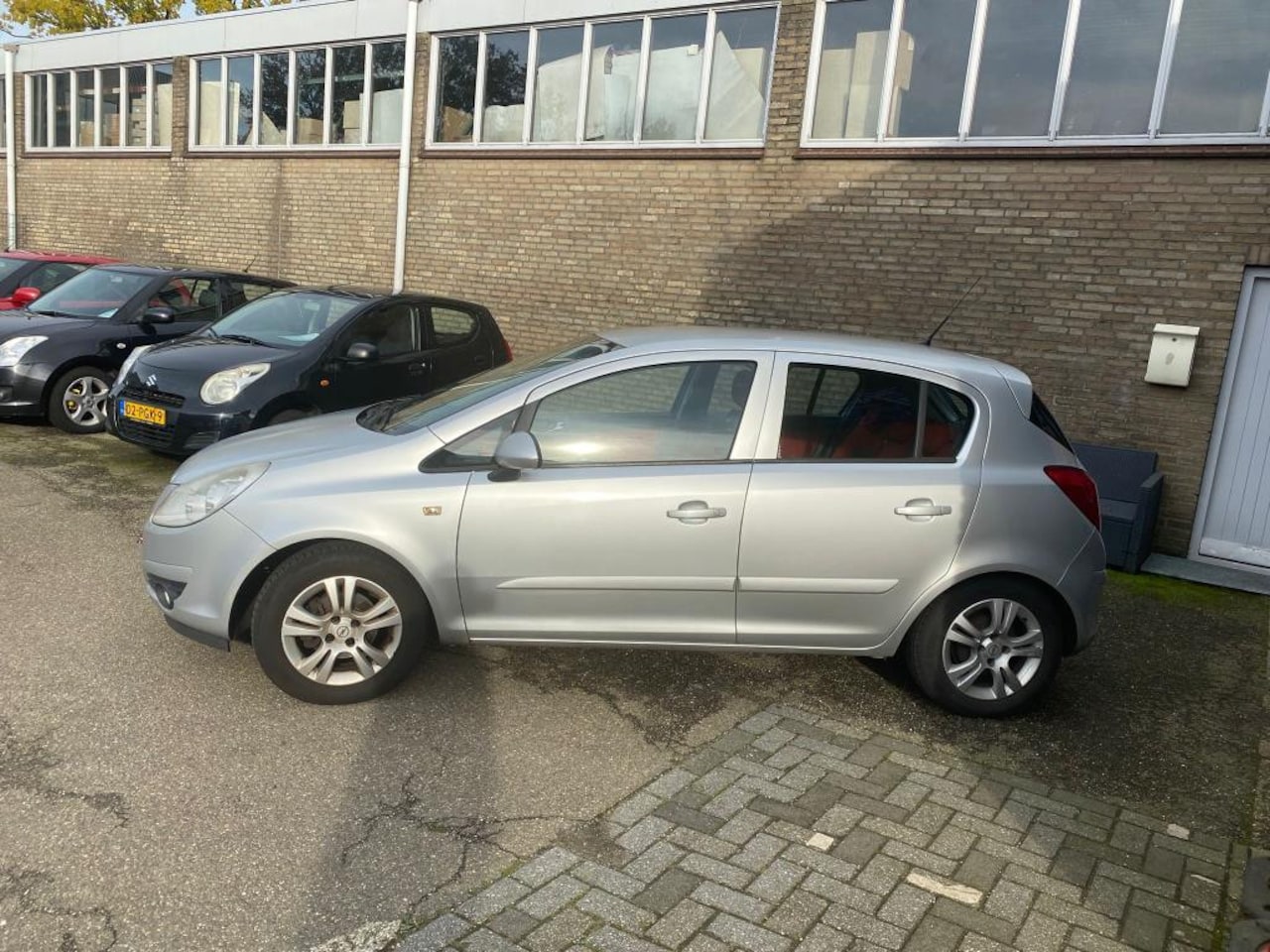 Opel Corsa - 1.2-16V Enjoy 1.2-16V Enjoy - AutoWereld.nl