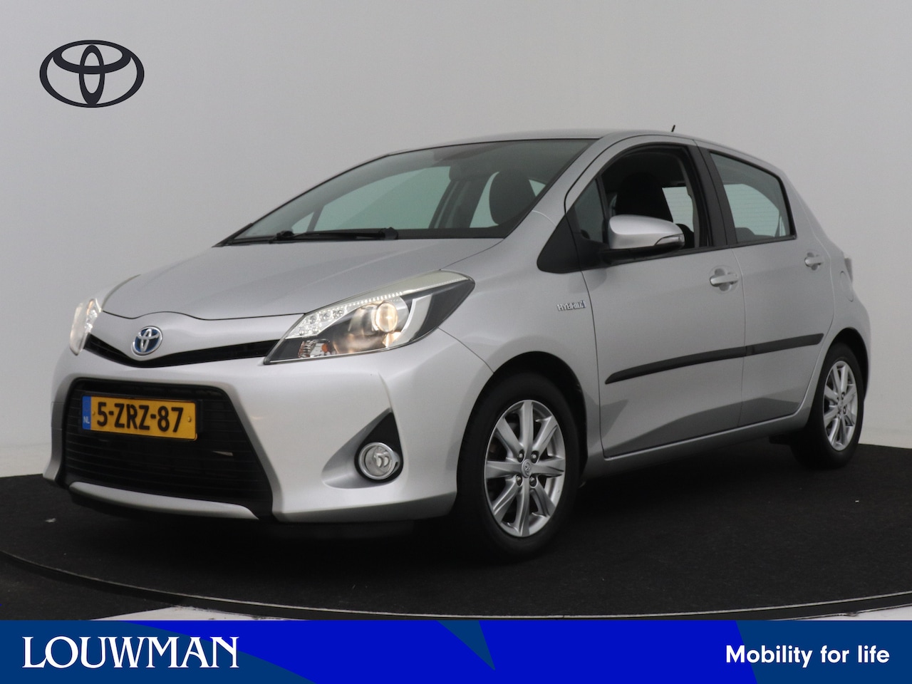 Toyota Yaris - 1.5 Full Hybrid Aspiration Limited | Navigatie | Climate Control | LM velgen | - AutoWereld.nl