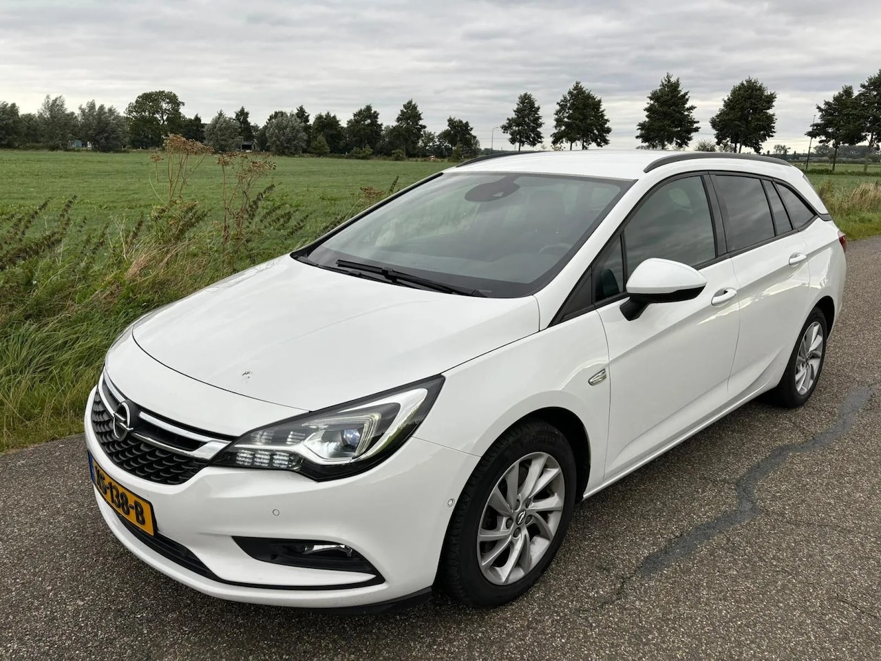 Opel Astra Sports Tourer - 1.6 Turbo Business Executive - AutoWereld.nl