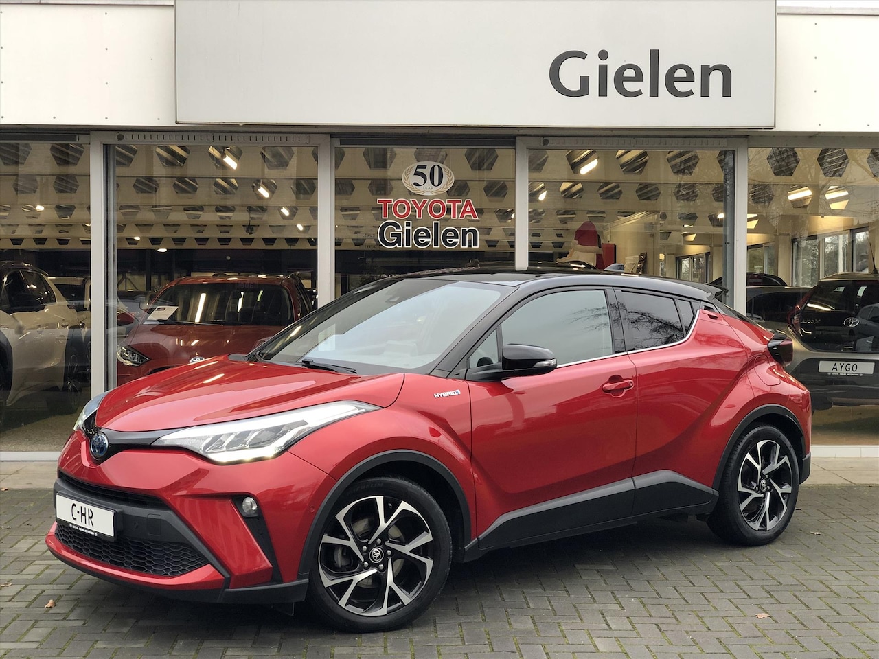 Toyota C-HR - 2.0 Hybrid 184pk Style Bi-Tone | Dodehoekherkenning, Stoel + Stuurverwarming, Keyless, Car - AutoWereld.nl