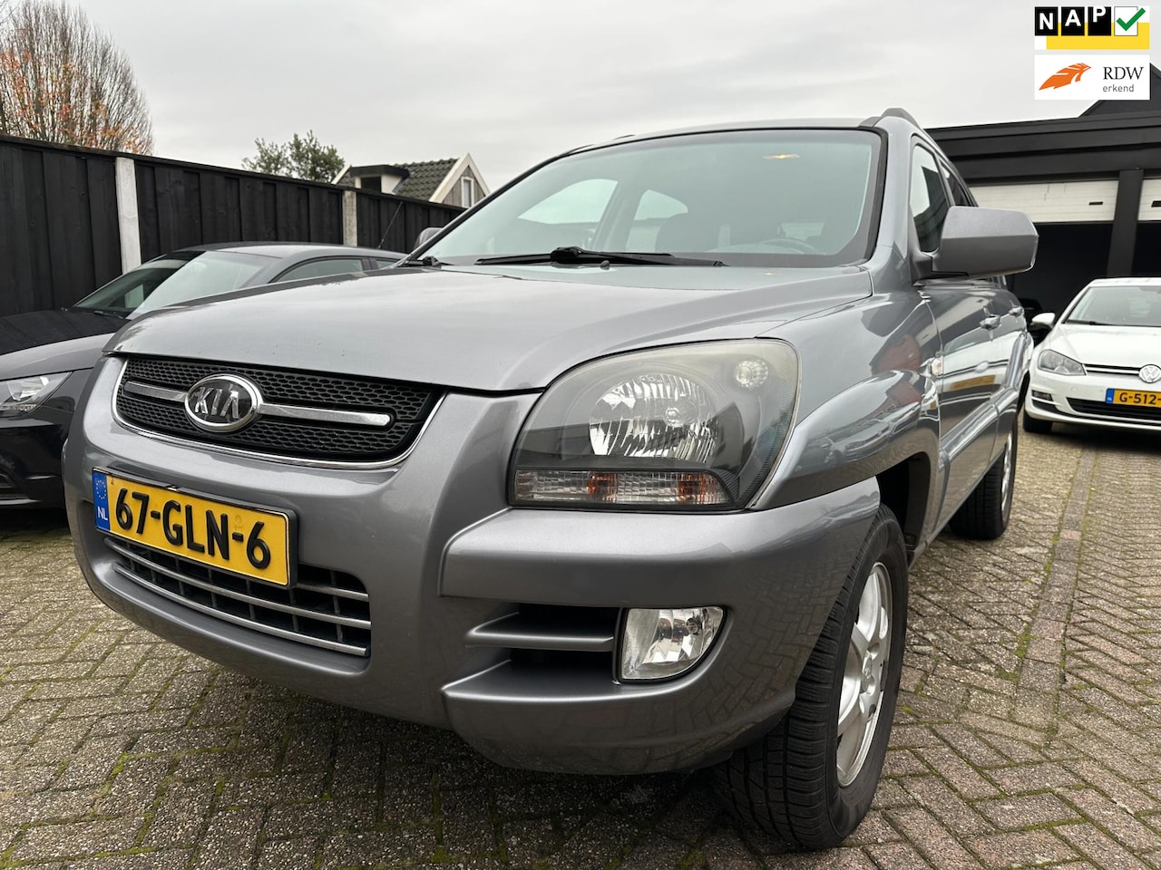 Kia Sportage - 2.0 CVVT X-cite LPG-G3-CLIMA-PDC-LEDER-CRUISE - AutoWereld.nl