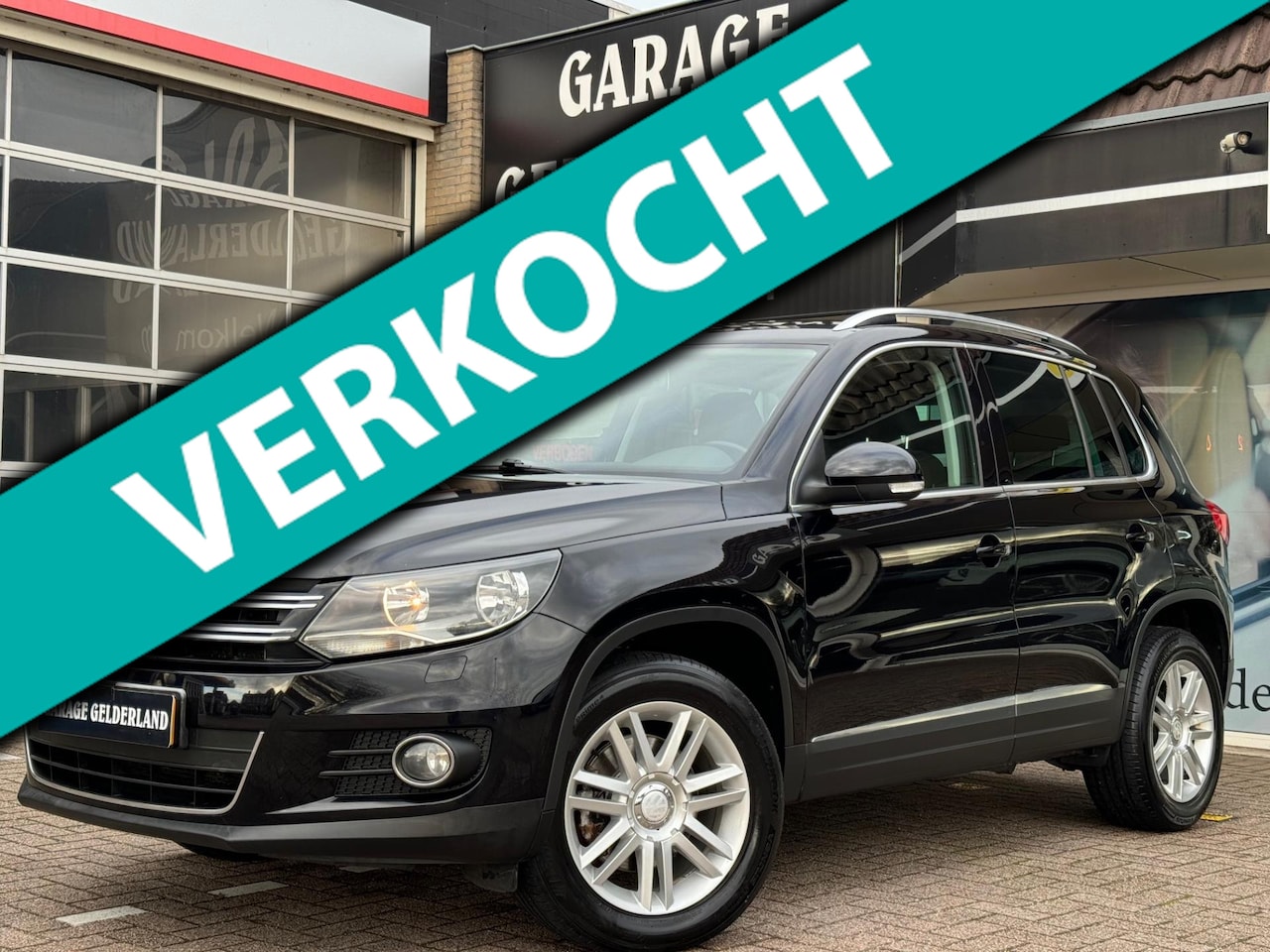 Volkswagen Tiguan - 1.4 TSI Sport&Style | Gr.Navi | Cruise | Climate | Pdc | Trekhaak | Iso | Stoelverw. | Ful - AutoWereld.nl