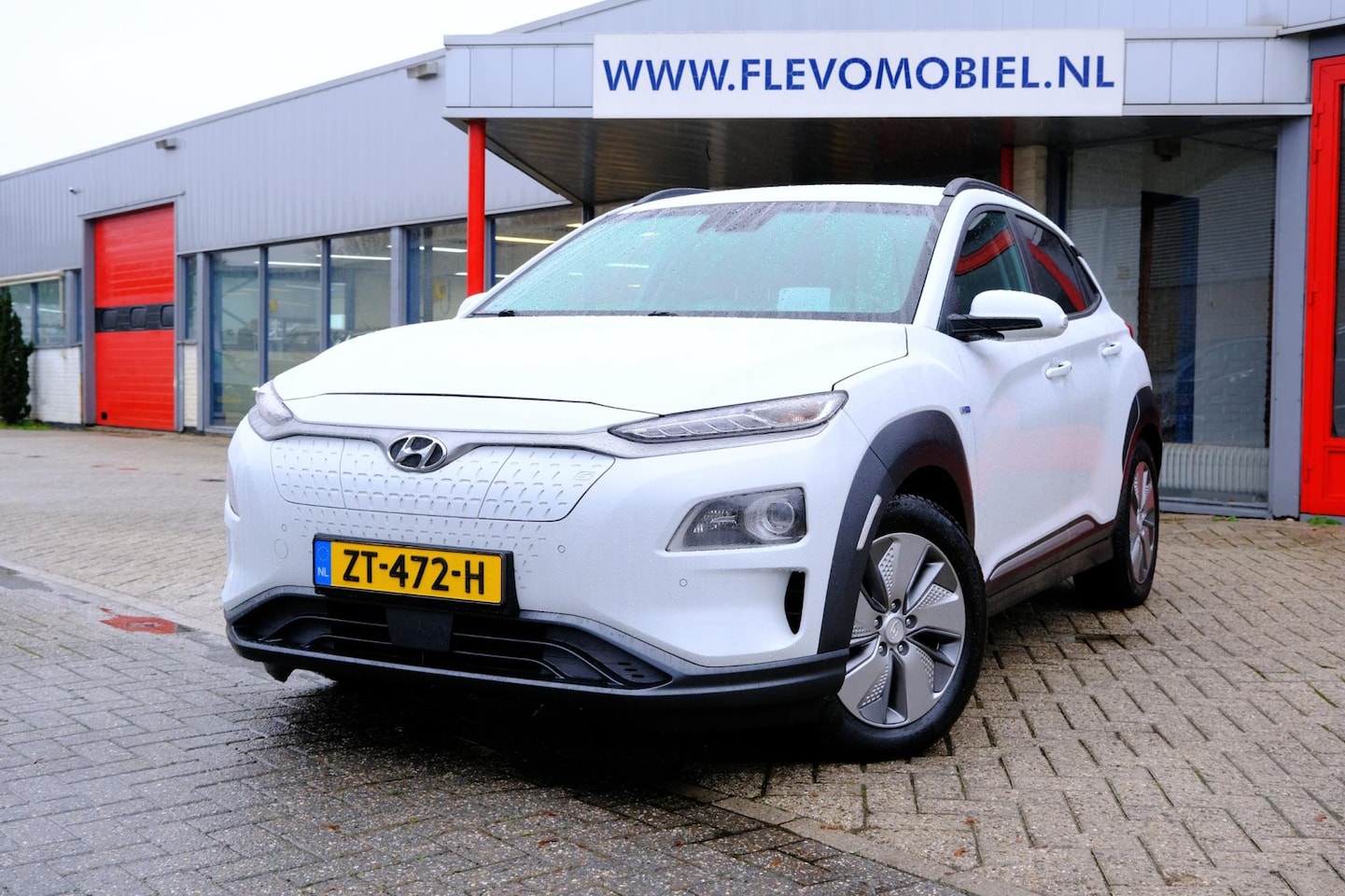 Hyundai Kona Electric - EV Premium 64 kWh Aut. *E 14.450 na subsidie* Leder|1e Eig|Navi|Clima|HUD|Apple CarPlay - AutoWereld.nl