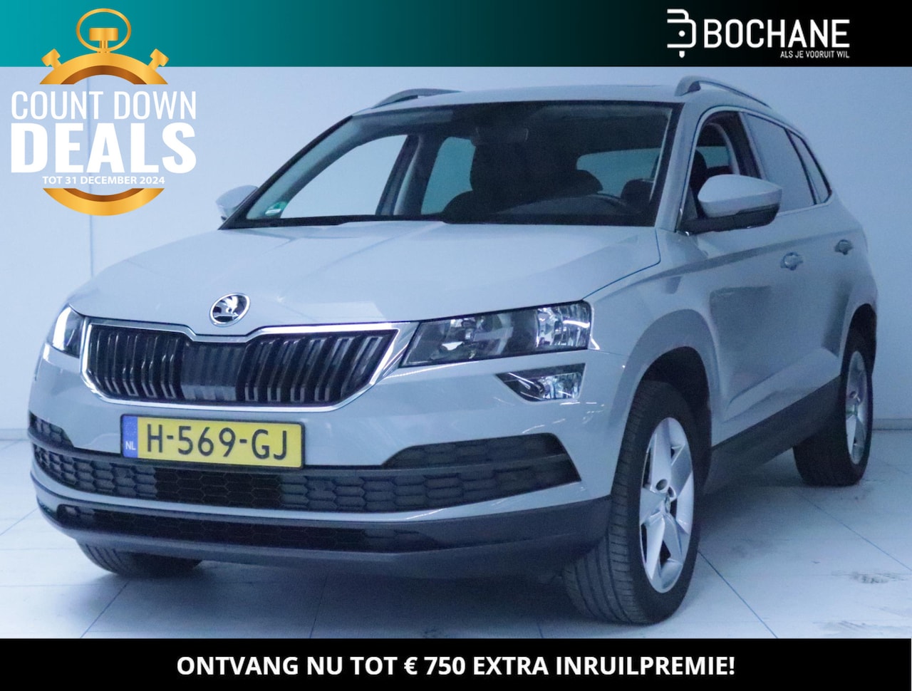 Skoda Karoq - 1.0 TSI Ambition Business Schuifdak/Clima/Navi - AutoWereld.nl