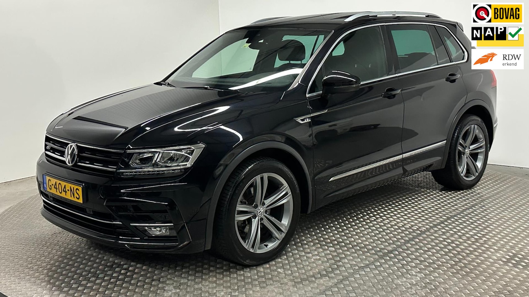 Volkswagen Tiguan - 1.5 TSI ACTR-Line Business navigatie cruisecontrole automaat benzine parkeersensoren - AutoWereld.nl