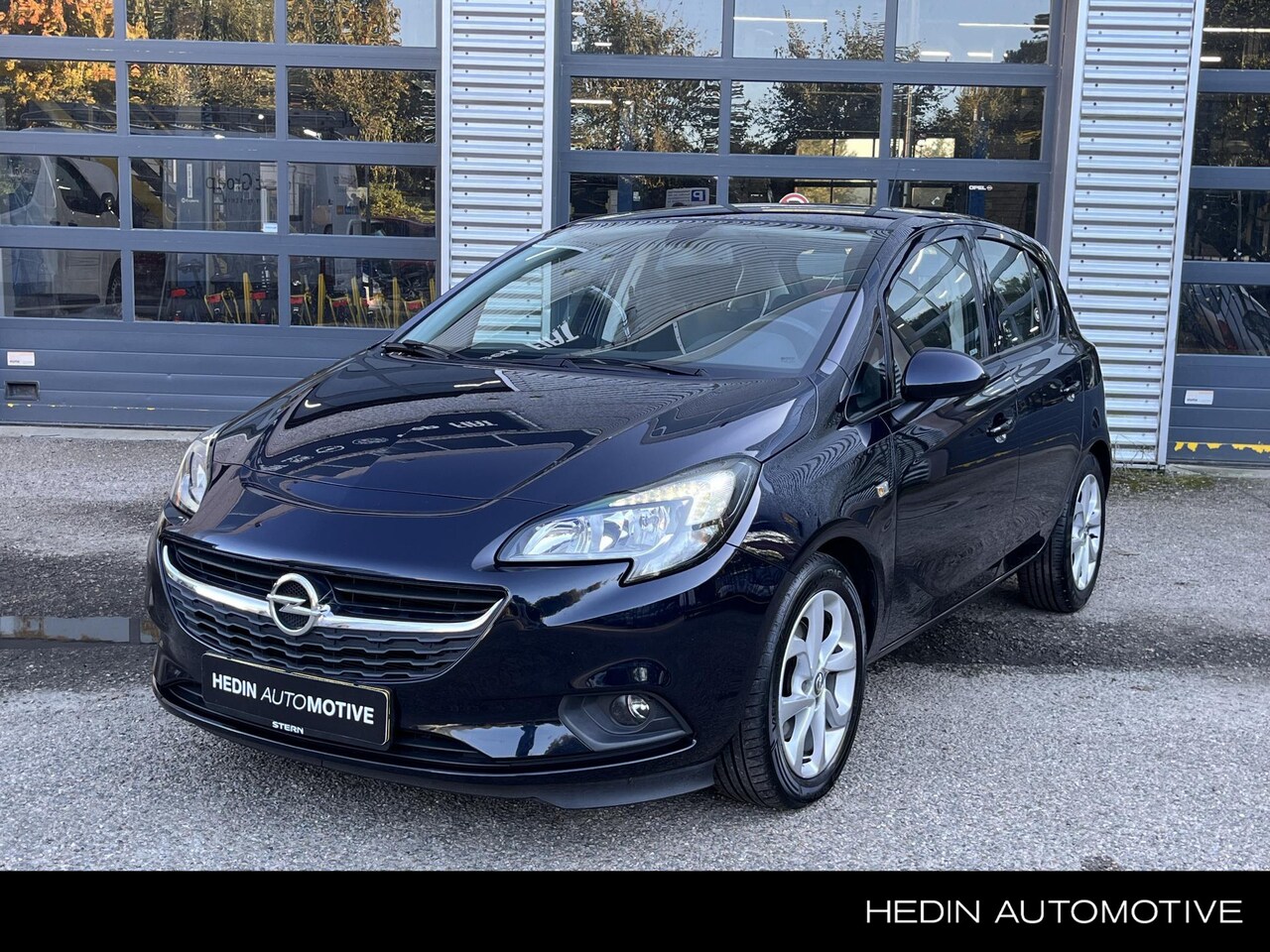 Opel Corsa - 1.4 Favourite | 90pk | Navigatie | Airco | Cruise control | - AutoWereld.nl