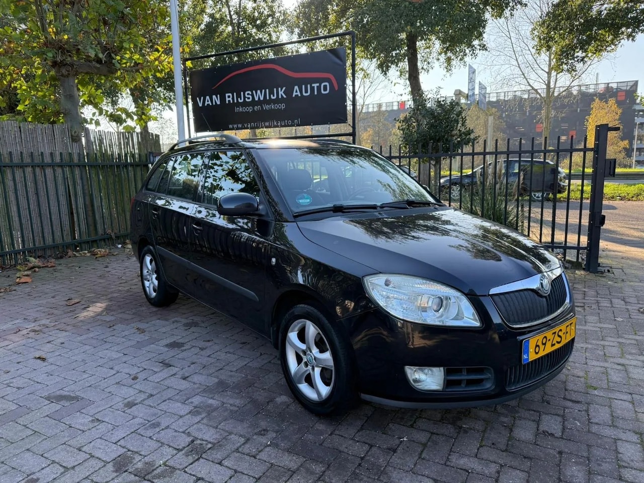 Skoda Fabia Combi - 1.4-16V Sport Clima Cruise-con Elec-ram - AutoWereld.nl