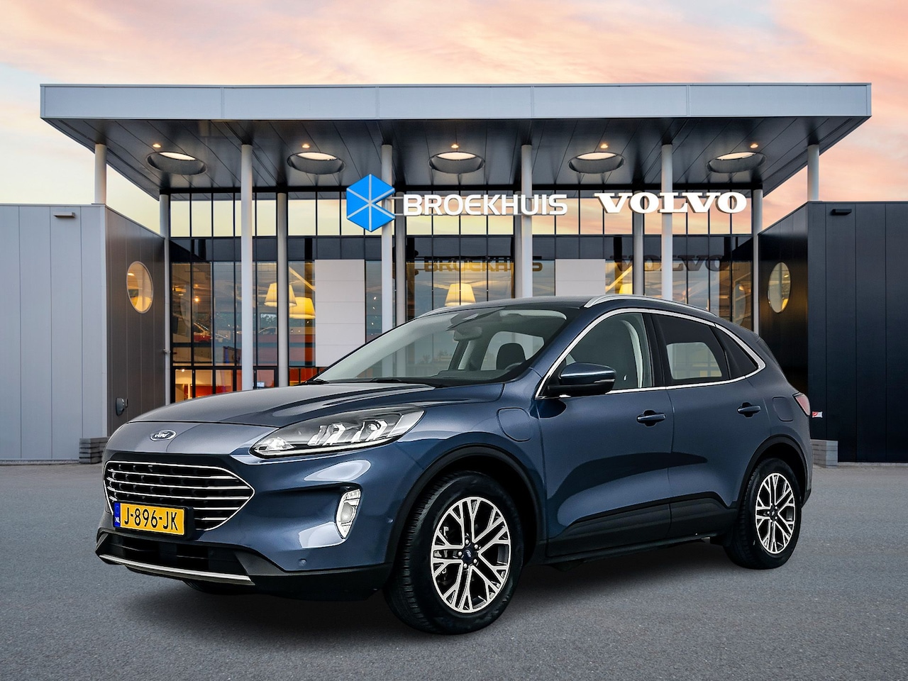 Ford Kuga - 2.5 PHEV Titanium | 100% dealer o.h. | Adaptieve cruise | Camera | Trekhaak | Winter-pack - AutoWereld.nl