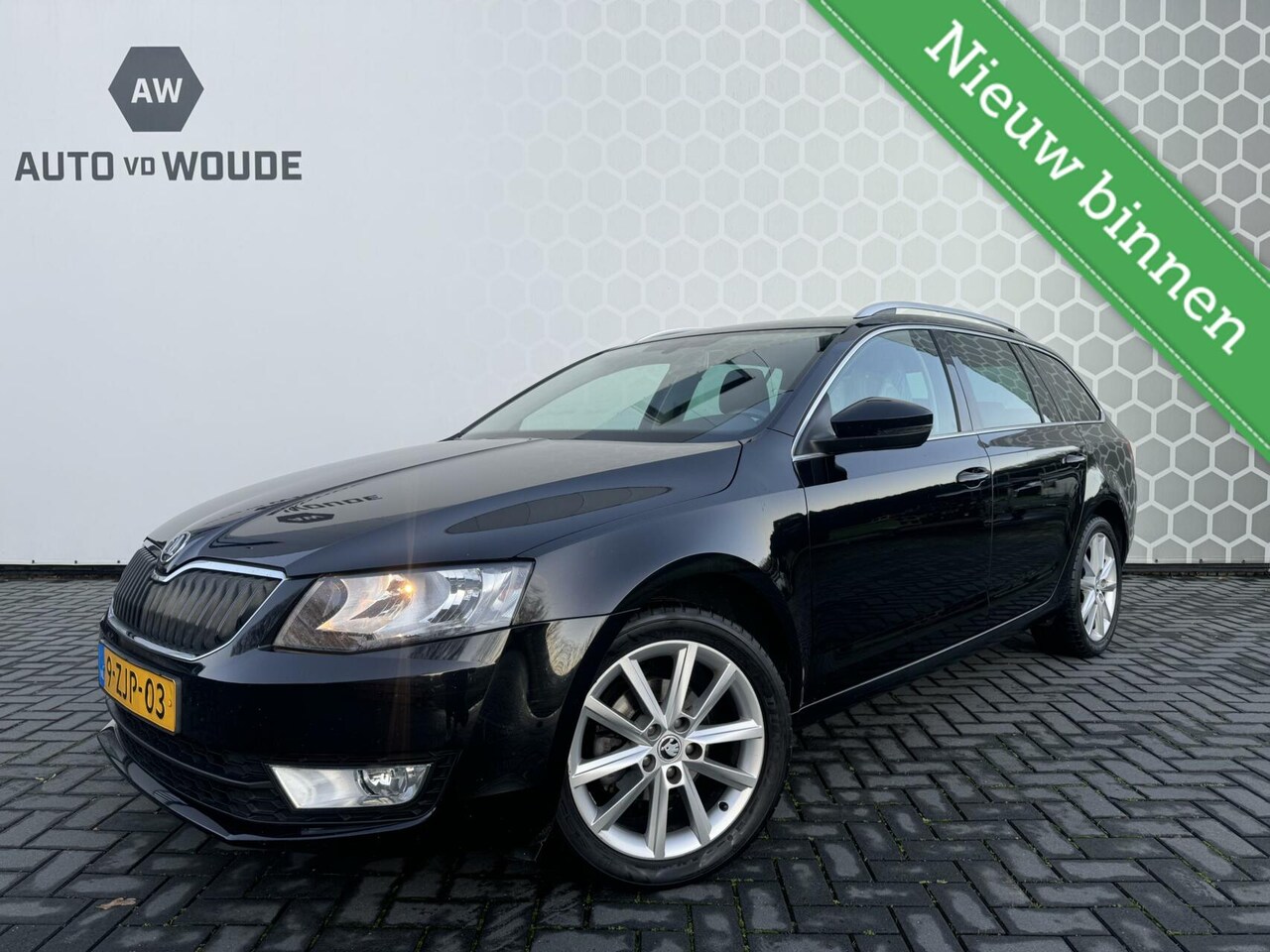 Skoda Octavia Combi - 1.2 TSI Greentech Elegance Stoelverwarmi - AutoWereld.nl