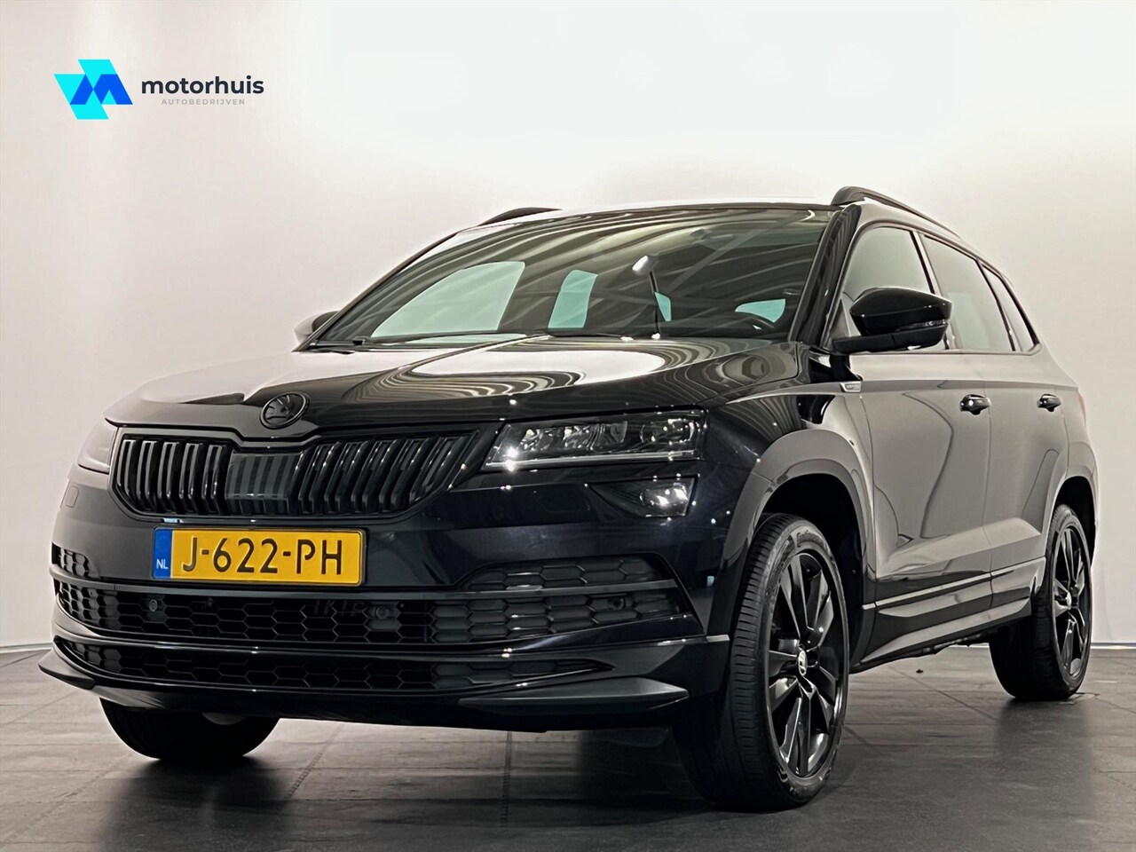 Skoda Karoq - 1.5 TSI 150PK AUTOMAAT SPORTLINE PANO VIRTUAL FULL LED NAVI NAP - AutoWereld.nl